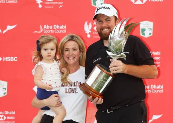 Shane Lowry with wife Wendy and daughter Iris, two.     Photograph: Warren Little/Getty