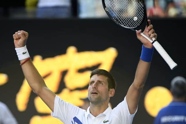 A code violation for swearing didnt damp Novak Djokovics winning celebrations. Picture: AP.