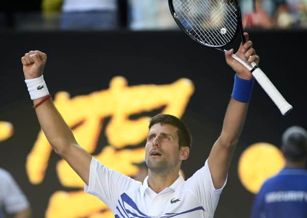 A code violation for swearing didnt damp Novak Djokovics winning celebrations. Picture: AP.