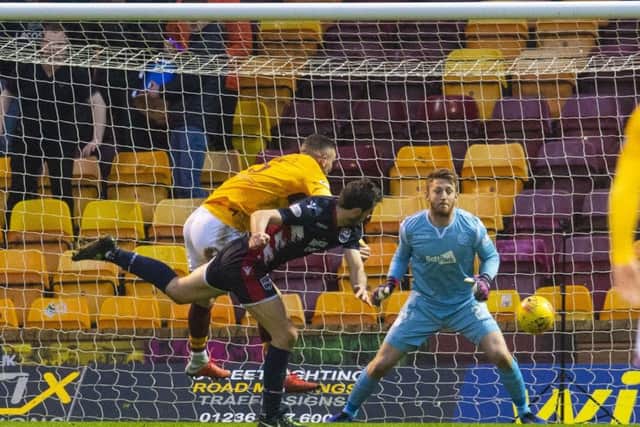 Ross County's Brian Graham heads home. Pic: SNS/Craig Foy