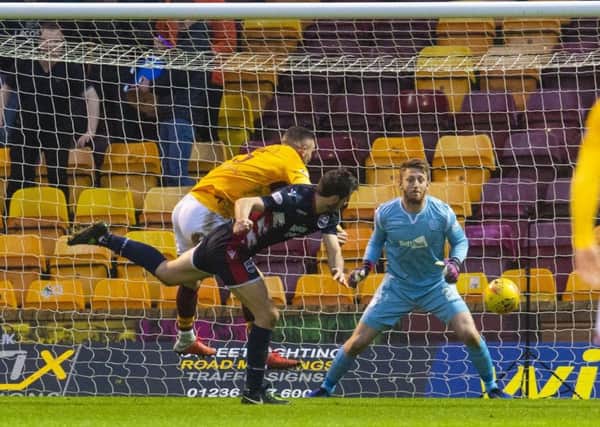 Ross County's Brian Graham heads home. Pic: SNS/Craig Foy