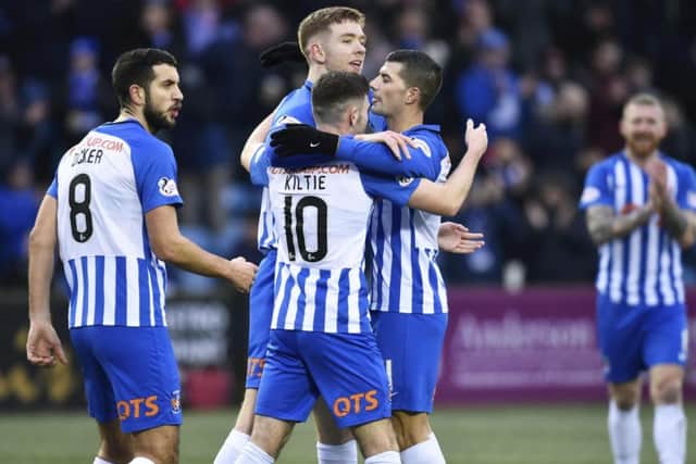 Kilmarnock's Stuart Findlay (centre) celebrates his goal. Pic: SNS/Rob Casey