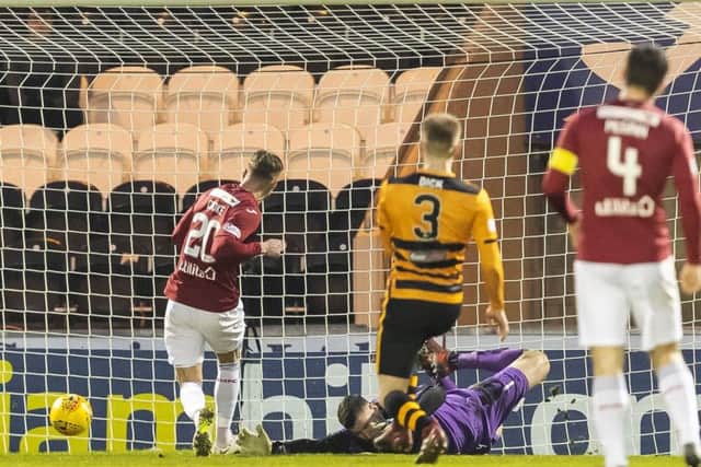 St Mirren's Cody Cooke scores St. Mirren's first. Pic: Roddy Scott/SNS