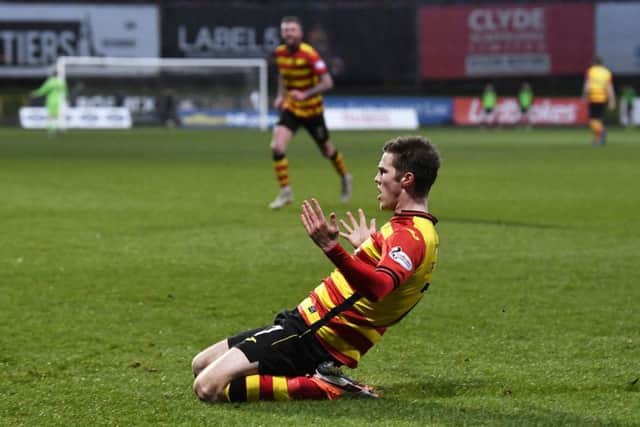Blair Spittal sealed victory by scoring Partick Thistle's fourth goal. Picture: SNS.
