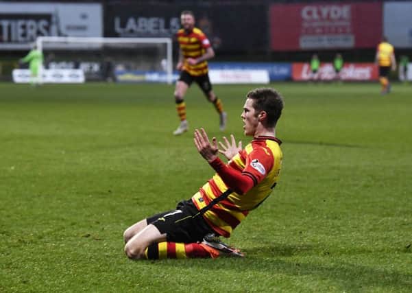 Blair Spittal sealed victory by scoring Partick Thistle's fourth goal. Picture: SNS.