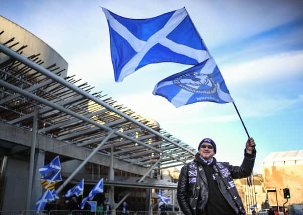 Independence supporters outside Holyrood. (Photo by Jeff J Mitchell/Getty Images)