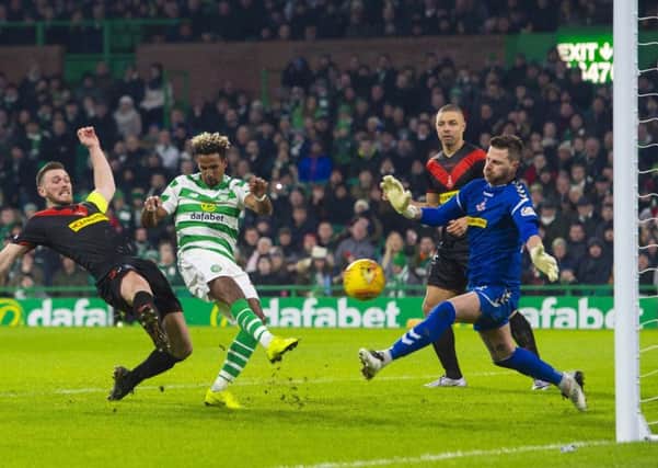 Celtic's Scott Sinclair stabs home to make it 2-0. Picture: SNS