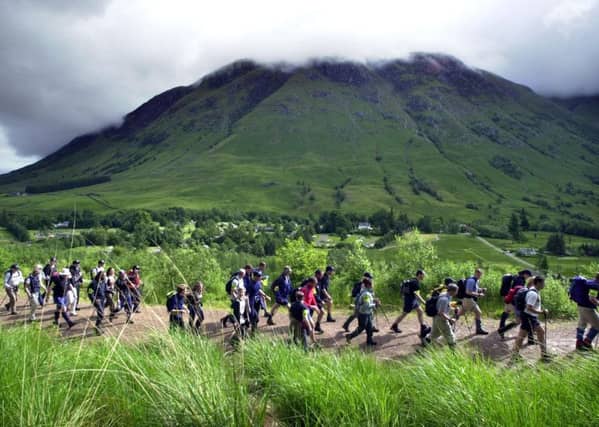 A group of walkers head along the West Highland Way near Ben Nevis. (Picture: Robert Perry)