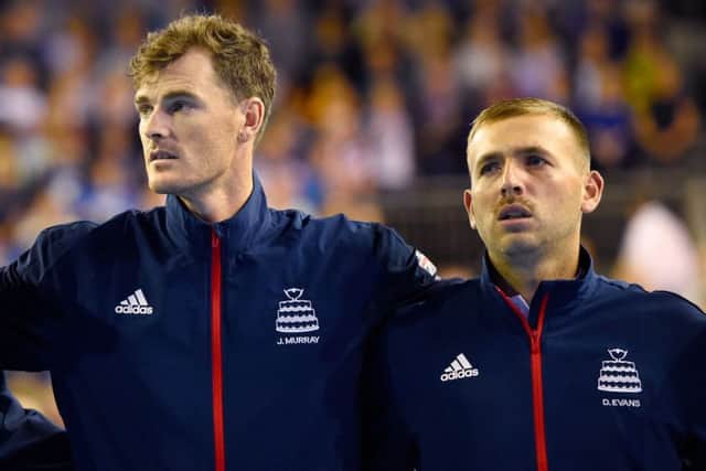 Jamie Murray (left) and Dan Evans pictured together in September last year. Murray has slammed Evans' comments about doubles players. Picture: PA