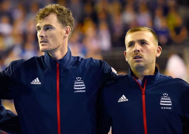 Jamie Murray (left) and Dan Evans pictured together in September last year. Murray has slammed Evans' comments about doubles players. Picture: PA
