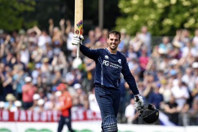 Calum MacLeod celebrates his century against England. Picture: SNS Group