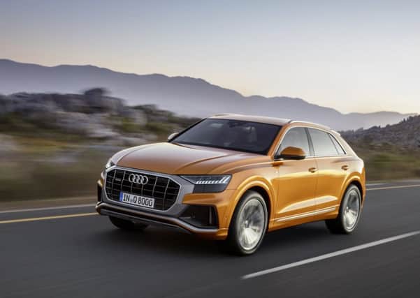 The dragon snarl of the Q8's grill puts its SUV competitors on notice.
