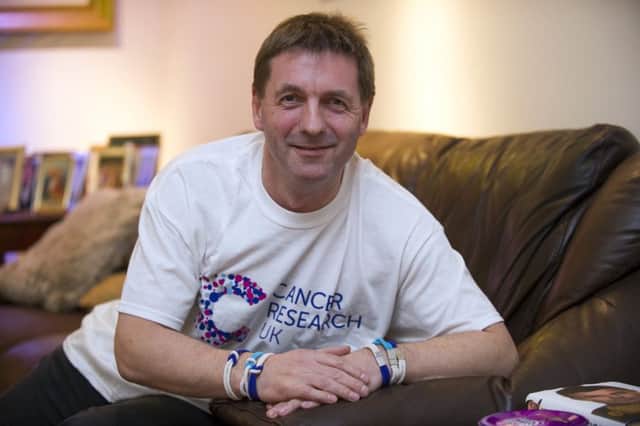 Father-of-three Stuart Riddell said Cancer Research UK's work had helped develop the treatment he received. Picture: Lesley Martin