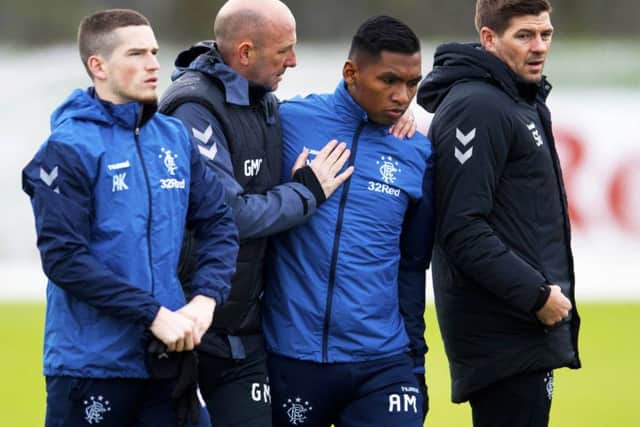 Alfedo Morelos with, left, Gary McAllister and Steven Gerrard. Picture: Craig Williamson/SNS