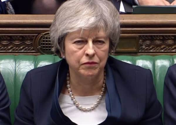 Theresa May suffered the biggest Commons defeat for a government in modern political history (Picture: AFP/Getty)