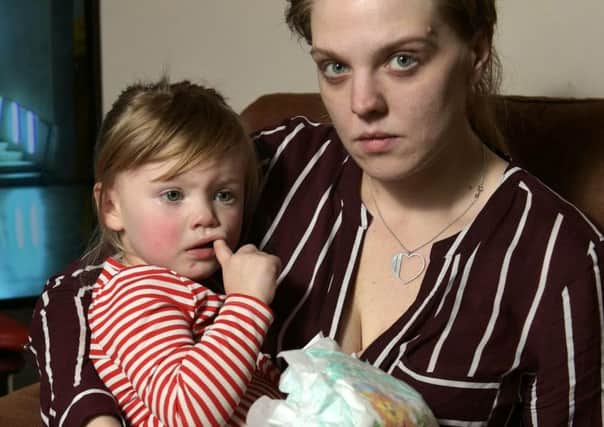 Mother Charlotte Downie,27, with her daughter Neve,2. Picture :SWNS