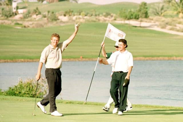 Colin Montgomerie birdies the 18th green for victory in the 1996 Dubai Desert Classic. Picture: Stephen Munday/Getty Images