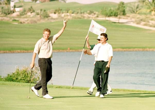Colin Montgomerie birdies the 18th green for victory in the 1996 Dubai Desert Classic. Picture: Stephen Munday/Getty Images