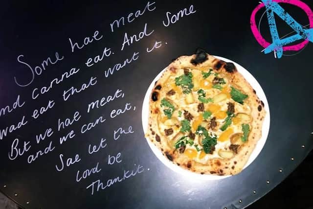 The unusual pizza features smoked mozzarella, roast potatoes, turnips, crispy kale and haggis (Photo: Pizza Punks / Facebook)