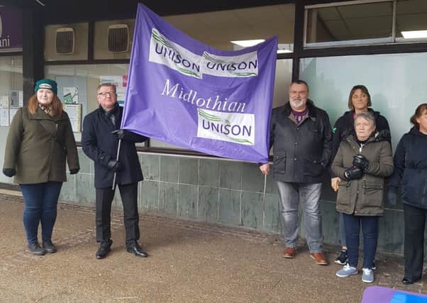 Unison union members protesting  against potential Midlothian Council cuts in Jarnac Court, Dalkeith, last week.