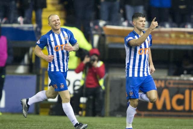 Jordan Jones (right) celebrates scoring the winner for Kilmarnock - against his future employers. Picture: PA