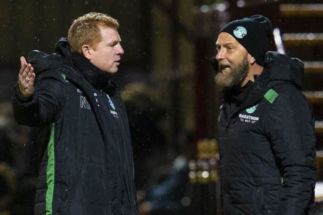A frustrated Neil Lennon in discussion with his No.2 Garry Parker as Hibs fail to find the net at Motherwell. Picture: SNS Group