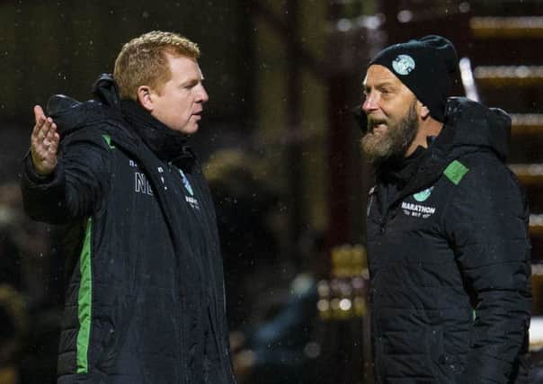 A frustrated Neil Lennon in discussion with his No.2 Garry Parker as Hibs fail to find the net at Motherwell. Picture: SNS Group