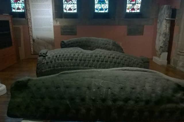 Three of the Viking-era hogback stones that were placed over graves in the ancient Govan burial ground. PIC: Contributed.