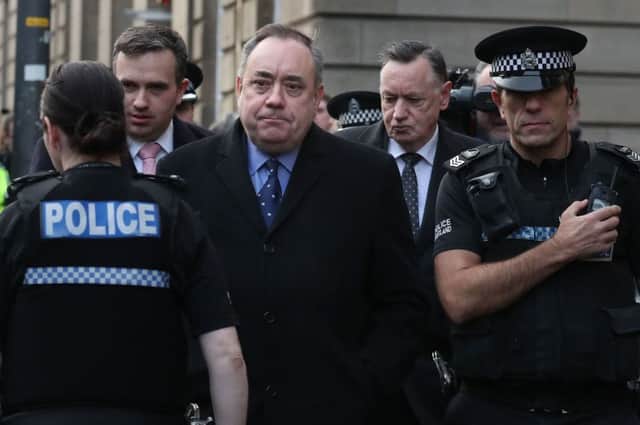 Alex Salmond leaves Edinburgh Sheriff Court after he was arrested and charged by police. Picture: Andrew Milligan/PA