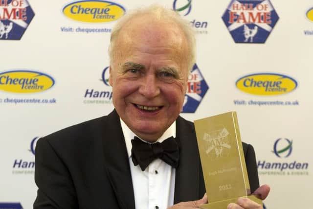 Hugh McIlvanney celebrates after being inducted into the Scottish Football Hall of Fame in 2011. Picture: SNS