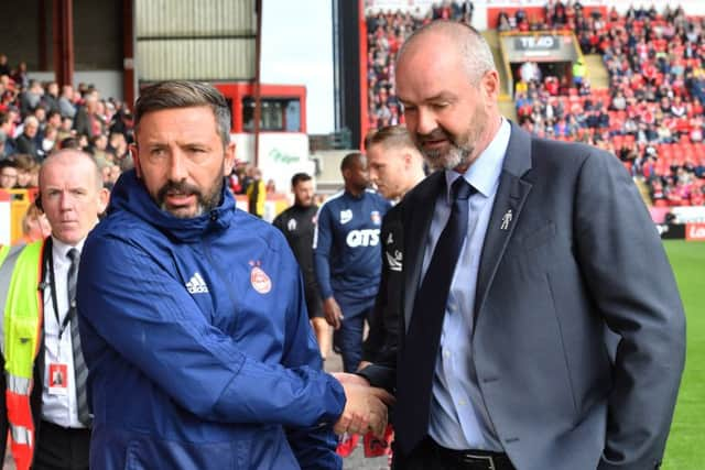 Aberdeen manager Derek McInnes and Kilmarnock boss Steve Clarke meet at Pittodrie. Picture: SNS/Bill Murray