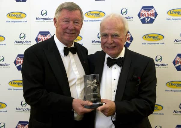 Hugh McIlvanney is inducted into the Scottish Football Hall of fame by his friend Sir Alex Ferguson in 2011. Picture: SNS