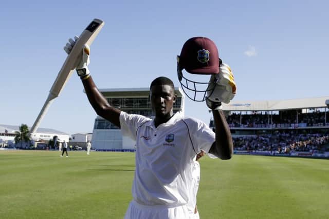 West Indies captain Jason Holder celebrates his double century against England. Picture: Ricardo Mazalan/AP