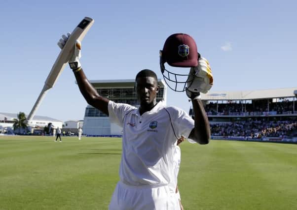 West Indies captain Jason Holder celebrates his double century against England. Picture: Ricardo Mazalan/AP