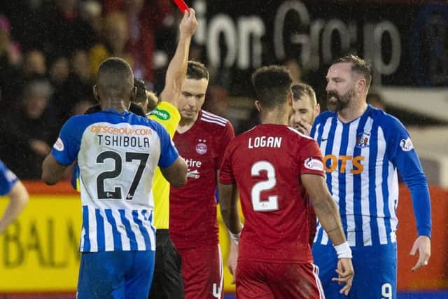 Referee Nick Walsh shows Kilmarnock's Kris Boyd a red card after a late challenge on Aberdeen's Graeme Shinnie. Pic: SNS/Ross Parker