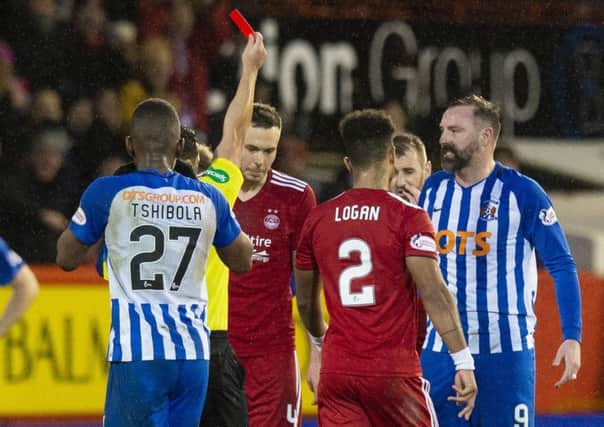 Referee Nick Walsh shows Kilmarnock's Kris Boyd a red card after a late challenge on Aberdeen's Graeme Shinnie. Pic: SNS/Ross Parker