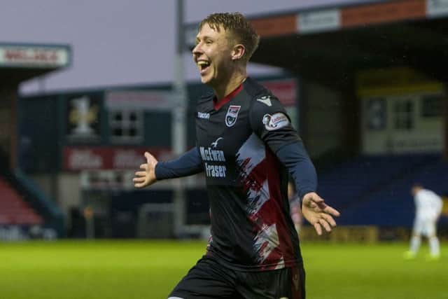 Ross County's Jamie Lindsay celebrates as he doubles his side's lead. Pic: SNS/Bruce White
