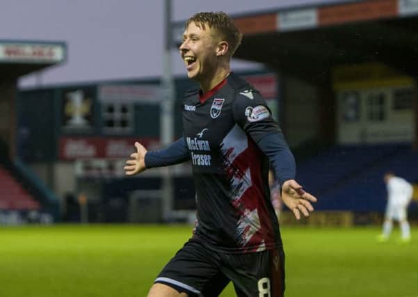 Ross County's Jamie Lindsay celebrates as he doubles his side's lead. Pic: SNS/Bruce White