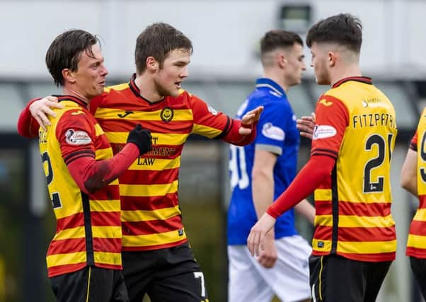 Partick Thistle's Joe Cardle(L) celebrates his goal with Aidan Fitzpatrick. Pic: SNS/Roddy Scott