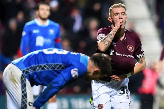 Callumn Morrison celebrates after wrapping up the win for Hearts against an off-colour St Johnstone. Picture: SNS.