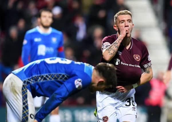 Callumn Morrison celebrates after wrapping up the win for Hearts against an off-colour St Johnstone. Picture: SNS.