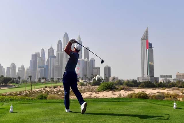 Bryson Dechambeau drives during the Omega Dubai Desert Classic. Picture: Giuseppe Cacace/AFP/Getty