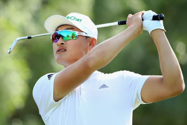 Chinas Haotong Li picked up a penalty in Dubai, while Bryson DeChambeaus slow play went unpunished. Picture: Andrew Redington/Getty