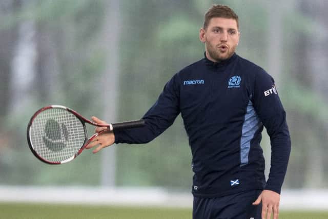 Scotland stand-off Finn Russell twirls a tennis racket after a knockabout during a training session at Oriam. Picture: Paul Devlin/SNS/SRU