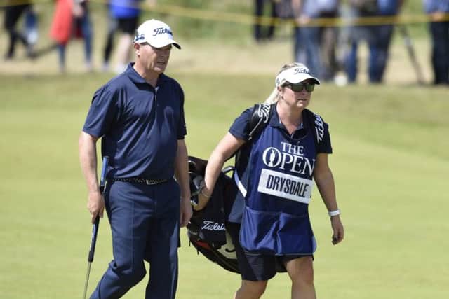 Vicky Drysdale caddies for her husband David. Picture Ian Rutherford