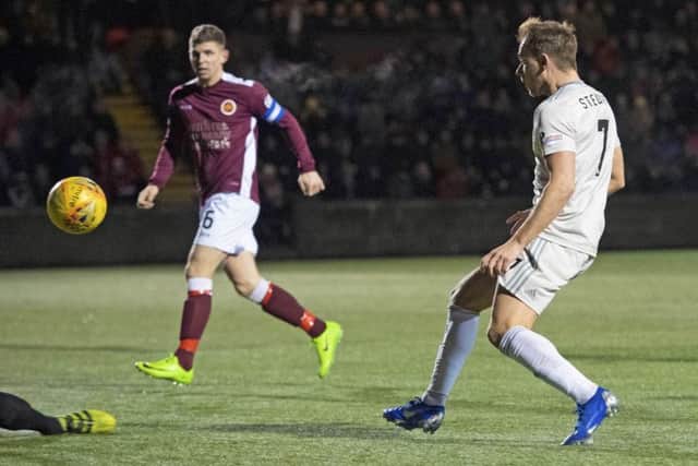 Greg Stewart scores his first goal for Aberdeen since arriving on loan to give his side a three-goal lead at Stenhousemuir. Picture: SNS.