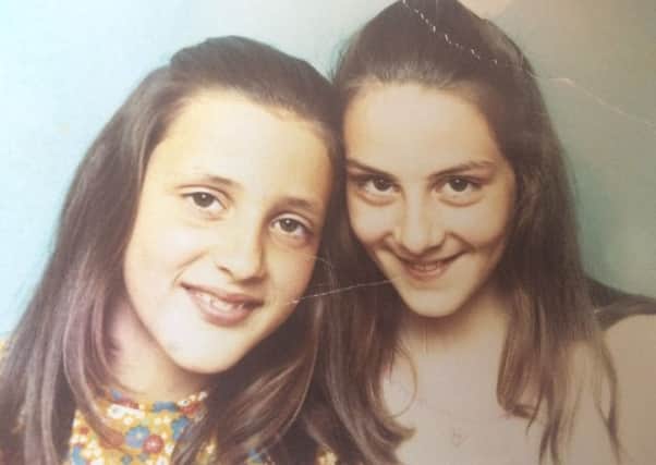 Author Catherine Simpson and her sister Tricia, pictured in 1973.