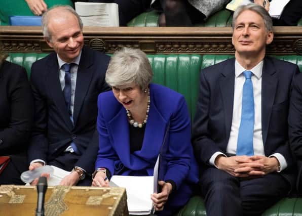 Theresa May faces MPs at Prime Ministers Questions following a Brexit debate in the House of Commons. Picture: Jessica Taylor/AFP/Getty Images