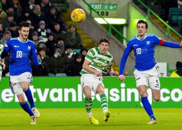 Ryan Christie watches his shot head goalwards as he doubles Celtic's lead against St Johnstone. Picture: SNS