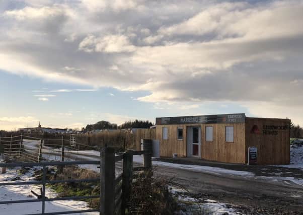 The sales hut on Culloden Moor was refused planning permission last year - but still stands. PIC: Contributed.